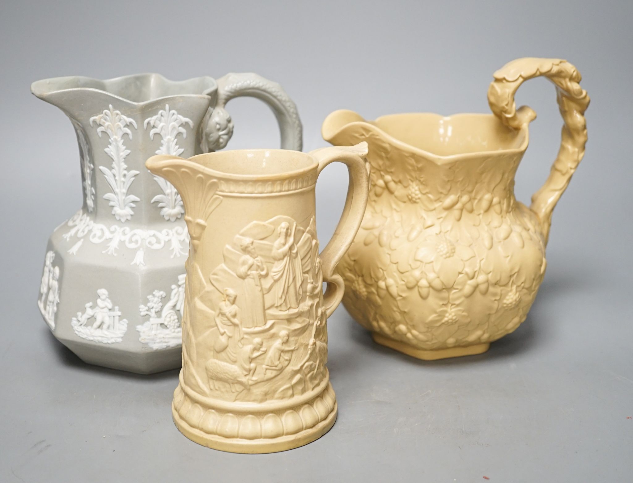 Five Victorian stoneware jugs and a blue jasper jug (6) 21cm